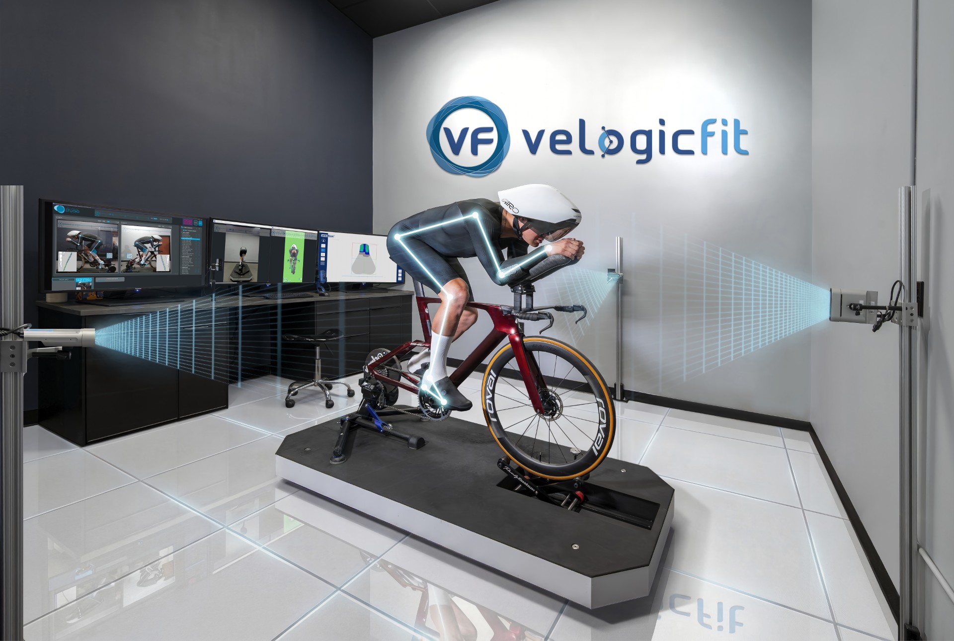 Rider in a futuristic bike fit studio with joint lines and projector grids